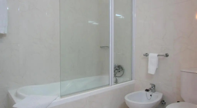 Четырёхместный номер Standard Vera Cruz Porto Downtown Hotel