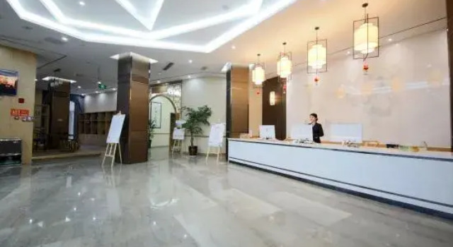 Huayi Kaiyuan Hotel (Wanda Plaza), Boek Hotel Meishan Sichuan