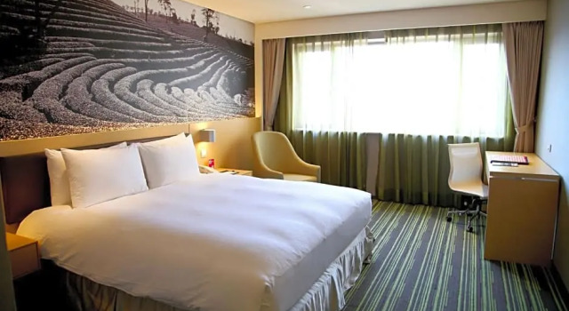 Номер Comfort Tao Garden Hotel