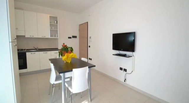 Апартаменты с 2 комнатами с балконом и с видом на город Flat in the Heart of Rosolina Mare