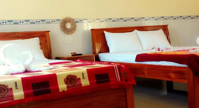 Четырёхместное бунгало с балконом и с красивым видом из окна Duc Anh Garden Homestay