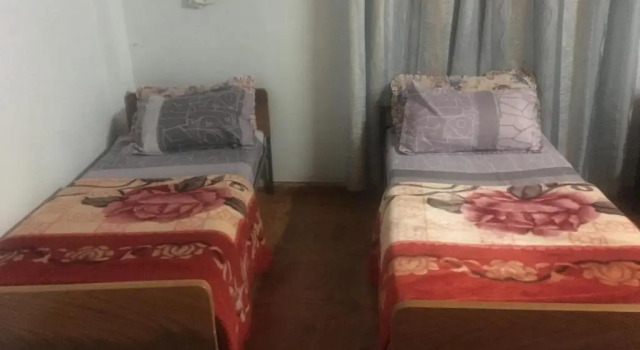 Cama em dormitório Sami Hostel