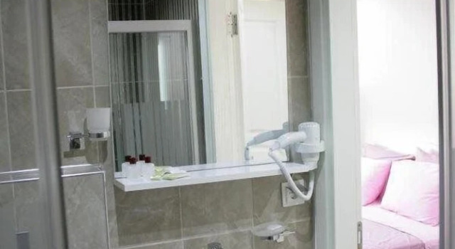 Четырёхместный семейный номер Standard с балконом Sakran Hotel