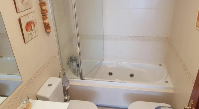 Апартаменты Apartamento en la playa con parking privado