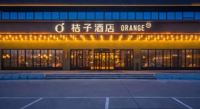 Orange Hotel (Jiaozhou Jiaodong International Airport Jiaodong Subway Station), Boek Hotel Hotels in Shandong met parkeren, Parkeren