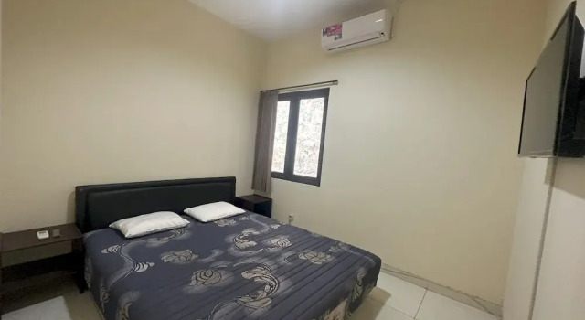 Camera Deluxe OYO 94118 Homestayque Syariah