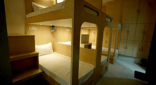 Кровать в общем номере Shri Govindam Hotels & Resorts