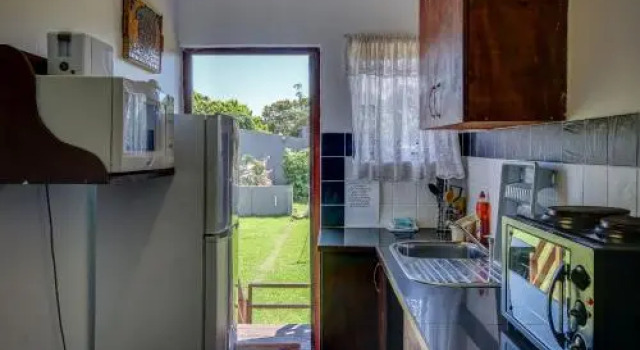 Khaya La Manzi Guest Lodge, Забронировать Гостевой дом Хибберден Durban South Coast, рядом с Пляж Hibberdene Beach