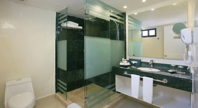 Кровать в общем номере The Grand Lifestyle At Grand Oasis Tulum- All Inclusive