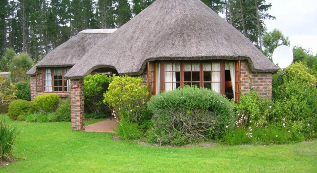 Коттедж Coral Tree Cottages