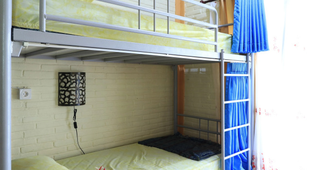 Кровать в общем номере Ubud Asri Homestay at Ubud