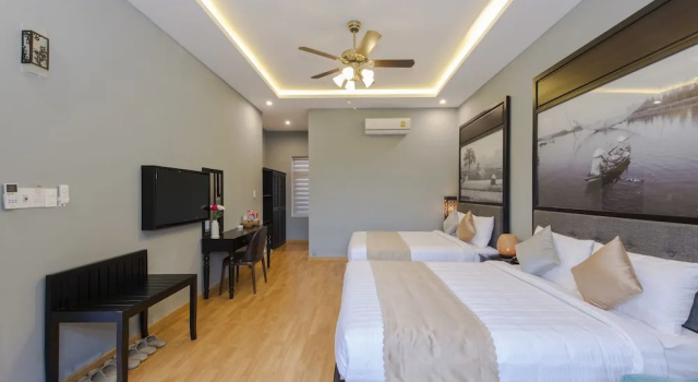Четырёхместный семейный номер Standard с красивым видом из окна Friendly Villa Hoian