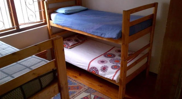 Кровать в общем номере Gansbaai Lodge & Backpackers