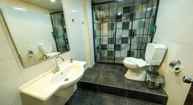 Семейный люкс рядом с пляжем Club Rose Bay Hotel