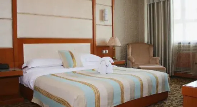 Семейный люкс Bingke Xixu Business Hotel (Kuitun Government Store)