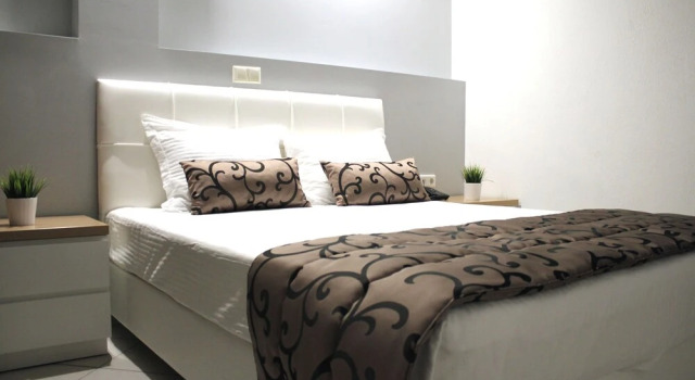 Четырёхместный номер Deluxe с 2 комнатами с балконом Zeus Hotel