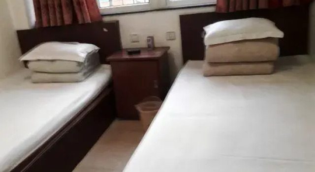 Трёхместный номер Standard Qixia Anjunju Hostel