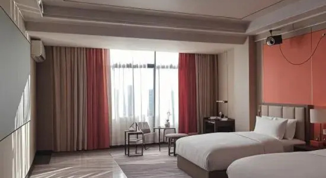 Люкс Deluxe Haikou Wangquan Movie Homestay (Meilan Airport)