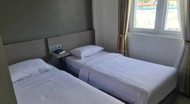 Двухместный номер Standard PURNAMA BALIGE HOTEL