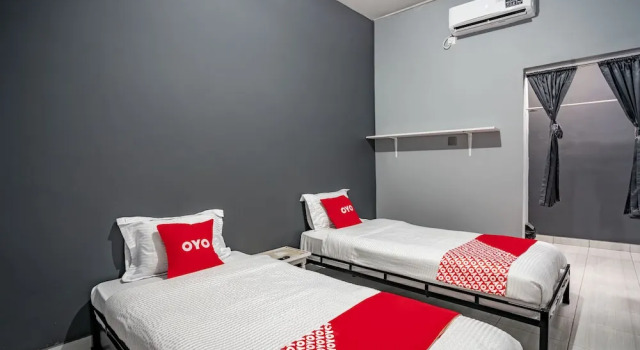Номер Deluxe SUPER OYO Gandaria Guest House Near Masjid Raya Sumatera Barat
