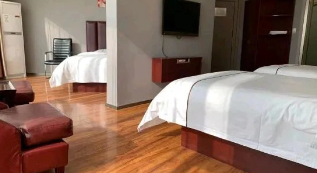 Люкс Business Kunlun Leju Business Hotel (Wenxian)