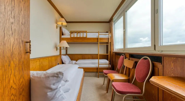Кровать в общем номере FF&E Hotel Dania