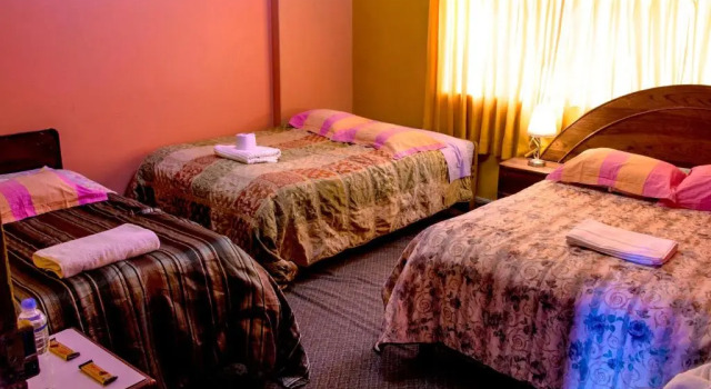 Кровать в общем номере Hostal Virgen de Las Nieves II