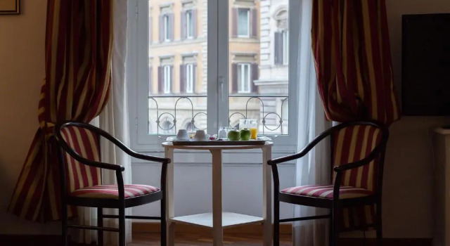 Полулюкс Inn Rome Rooms & Suites