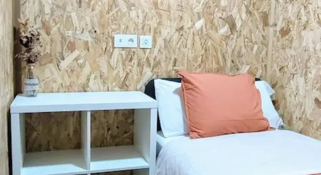 Кровать в общем номере с видом на город Donna Nega Guest House