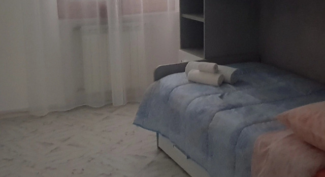 Кровать в общем номере с 2 комнатами с балконом B&B A Casa di Anto