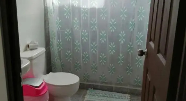 Кровать в общем номере Cabinas Palmer