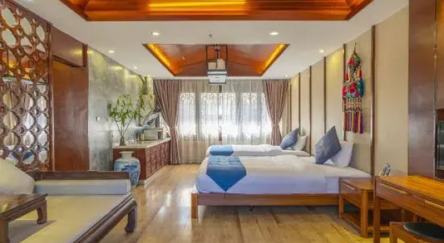 Семейный люкс Deluxe с 2 комнатами Floral Hotel Dali Honglongjing Junrui