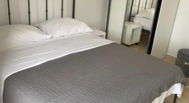Апартаменты с 3 комнатами Apartmani Leona