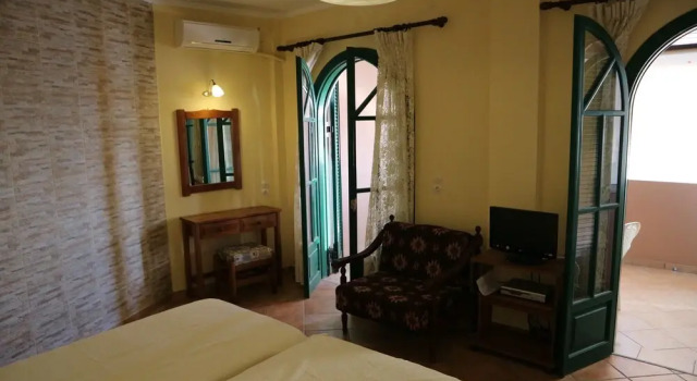 The Harmony - Beachfront sea View Apartment, Забронировать Апартаменты/квартира Айос-Георгиос Остров Корфу