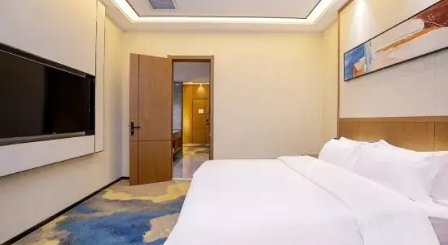 Люкс Wutong Hotel (Yingbin Road, Wanda Plaza, Huiji, Zhengzhou)