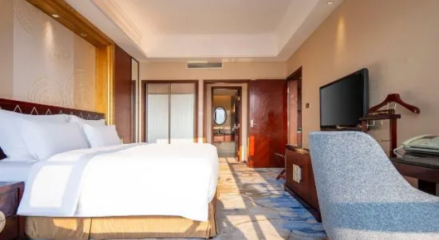 Люкс Business Jiucheng Hotel Luzhou
