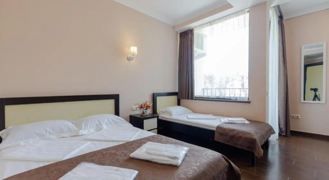 Camera quadrupla Standard con balcone GNS Hotel