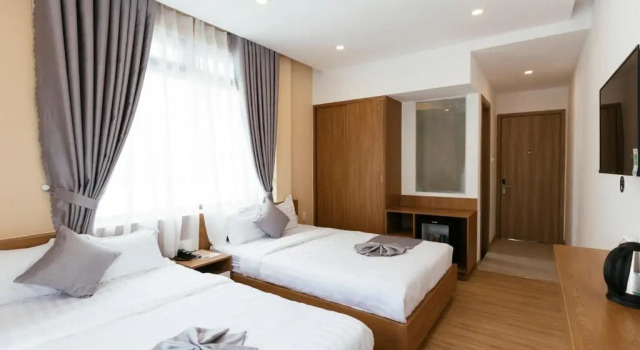 Номер Deluxe Minh Chi Hotel