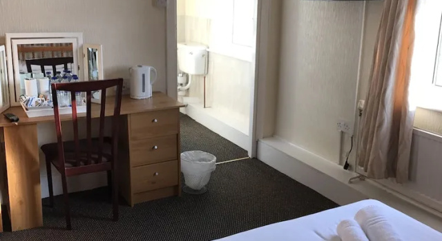 Четырёхместный номер Standard Queens Plaza Hotel
