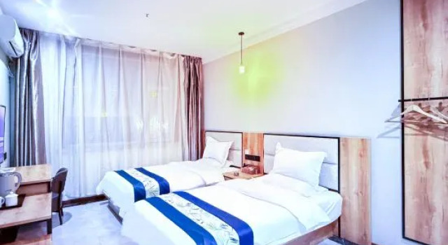 Семейный люкс Business Kunlun Leisure Hotel (Xiayuan Gongshi Times City, Taiyuan)