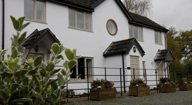 Кровать в общем номере Burlton Inn