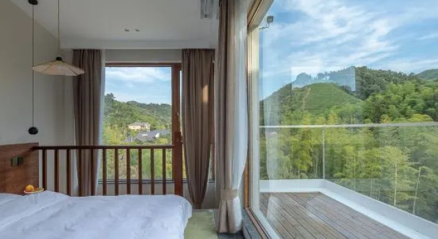 Кровать в общем номере Huzhou Miaoxi Boutique B&B