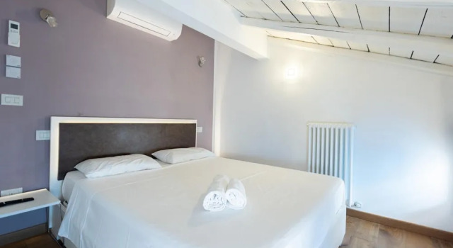 Asinelli in Bologna with 1 bedrooms and 1 bathrooms, Забронировать Отель Болонья провинция Болонья, рядом с Башня Гарисенда
