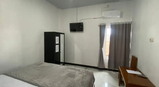 Camera Deluxe Hotel O Muula Homestay Syariah