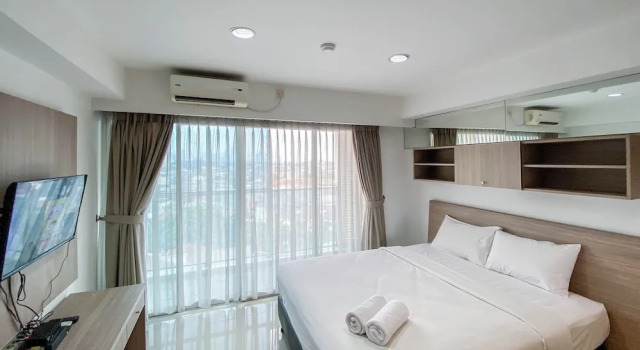 Студия Homey And Cozy Living Studio At Tamansari The Hive Apartment
