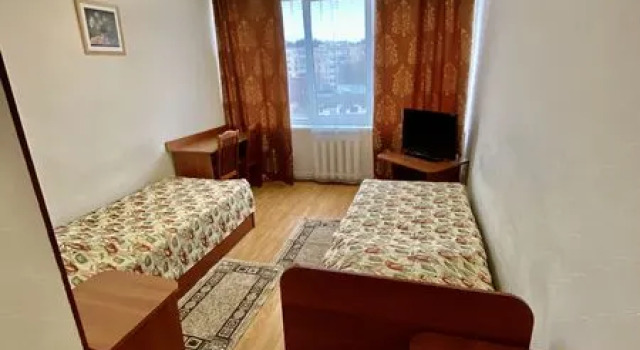 Кровать в общем номере Отель Звенигород