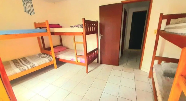 Кровать в общем номере Multiverso Hostel