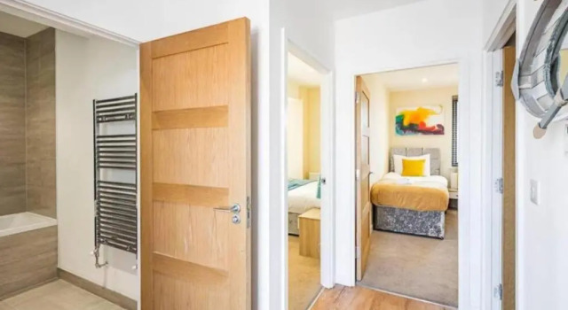Кровать в общем номере Unwind In This Prestigious Central with balcony Apartment!