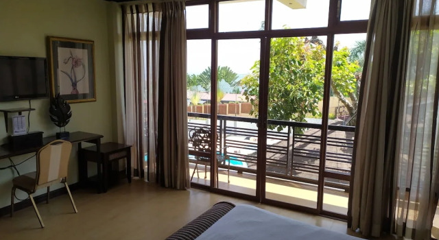 Кровать в общем номере Seascape Resort