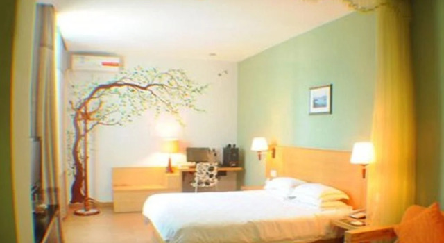 Dan Zhou Xin Bao Lai Holiday Hotel, Book Hotel Danzhou Hainan
